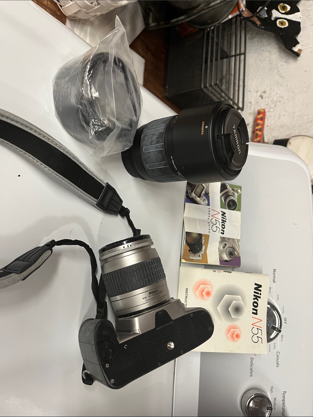 Nikon Silver and Black SLR Camera Body with Extra Black Telephoto Lens